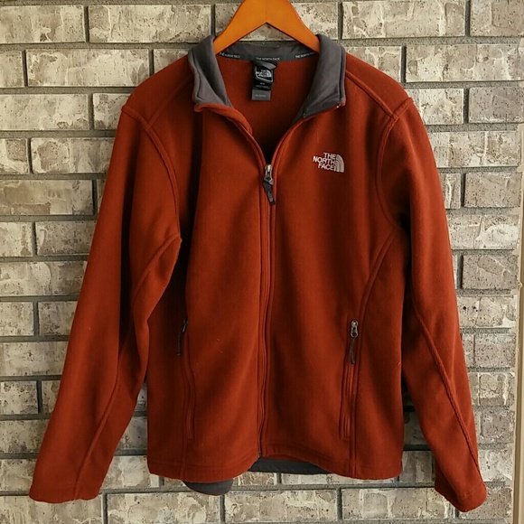 north face burnt orange jacket
